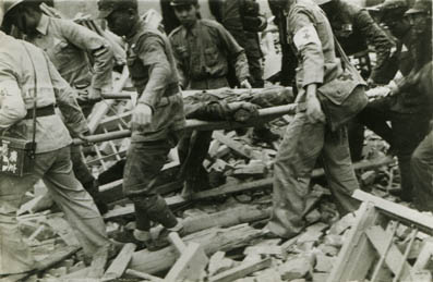 Red Cross Workers Carrying Wounded